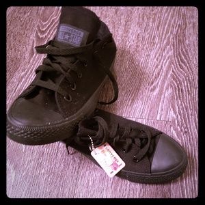 Women's black Converse All-star.